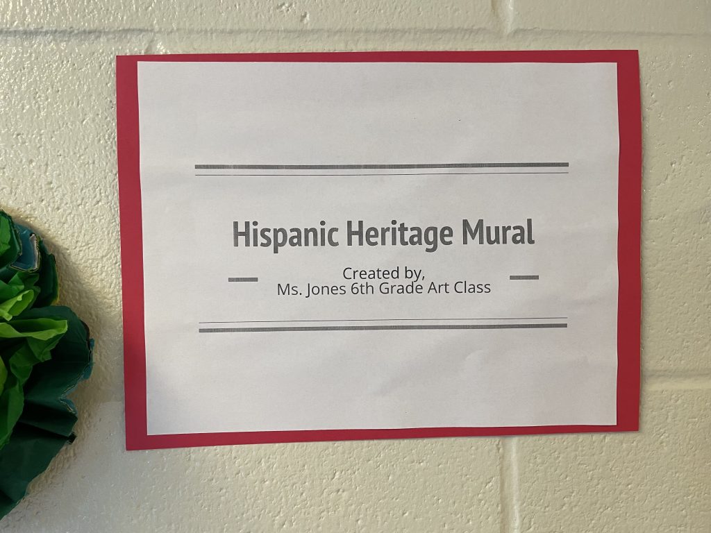 Sign for the Hispanic Heritage Month mural.